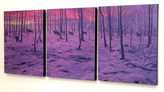 Sunrise woodland snow scene with herd of red deer